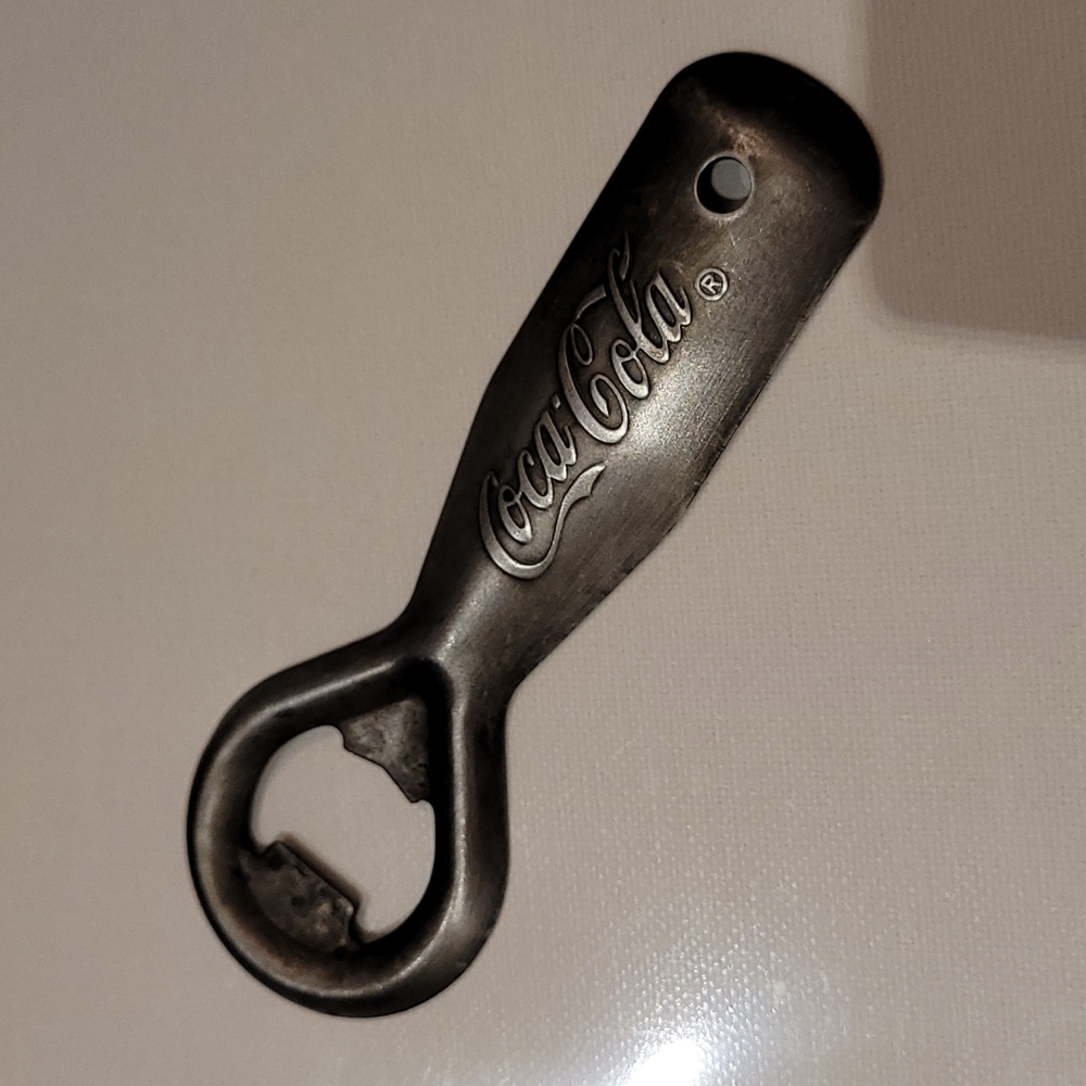 Vintage antique Coca-Cola opener